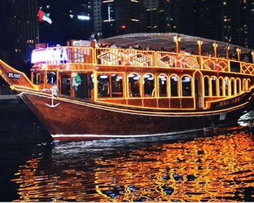 Dhow Cruise Dubai MarinaEnglish Speaking Tour Guide/Driver 2 Hours Cruising in Dubai Marina, Yatch Club, Marina Towers Access to Air Conditioned Lower Deck and Open Air Upper Deck Welcome Drinks, Water, Tea & Coffee Arabic Sweets & Fresh Fruits Panoramic Scene of Dubai Marina Skyline Selection of fresh Fruit Salads and Tasty Desserts Buffet Dinner Catered by a 5* Hotel for both veg and non-veg diets Tanura Dance Show by Professional Artist Family Entertainment Drop back your location